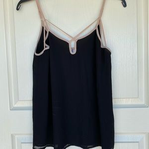 Black top with pink trim work